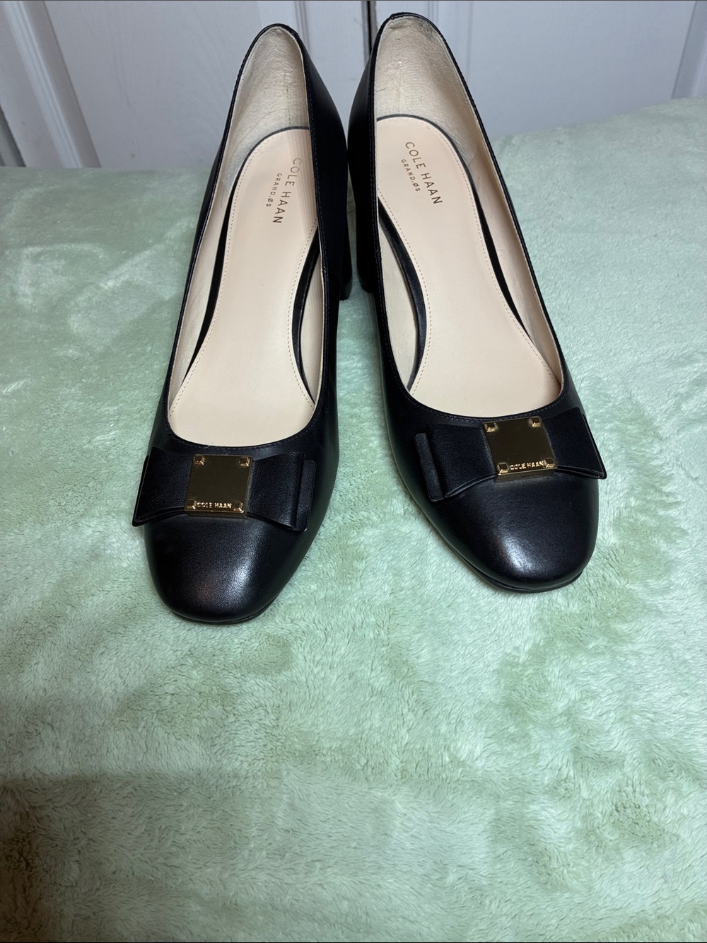 Cole Haan Black Leather Bow Block Heels with Gold Plaque